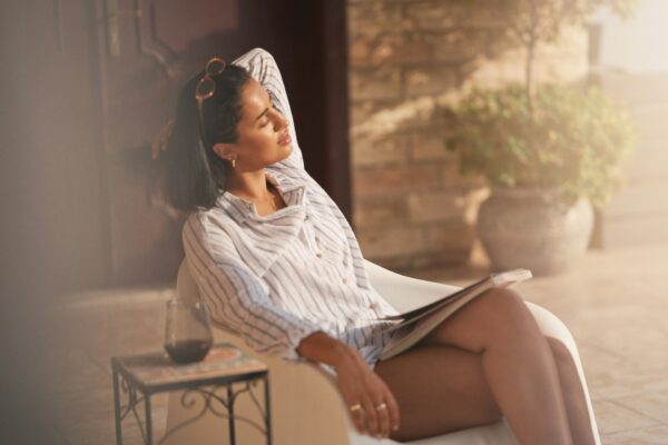 woman enjoying sunlight and stillness
